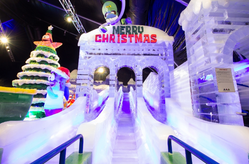 The ice slide is a crowd favorite at Moody Gardens ICE LAND: Ice Sculptures with SpongeBob SquarePants that opened Saturday in Galveston, TX (PRNewsFoto/Moody Gardens)